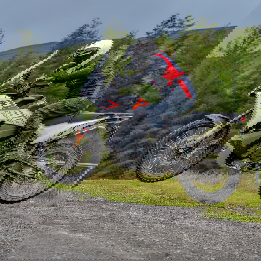 A 790 Adventure motorcycle jumping through the air